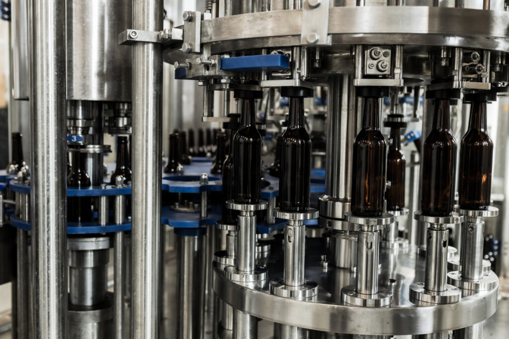 The Wennström family actively participates in the installation and maintenance of their brewing equipment, example this bottling machine.